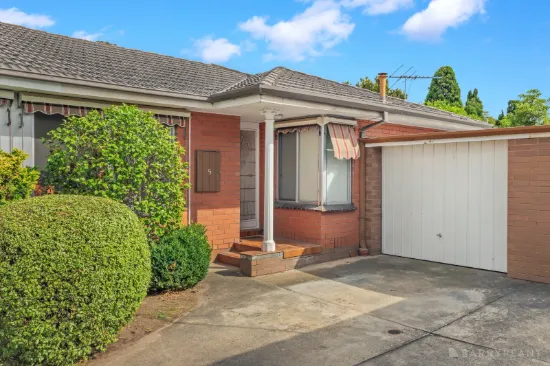 SPACIOUS TWO-BEDROOM UNIT WITH RARE WRAPAROUND YARD