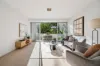 The jewel of the development - a sun-soaked, modern townhouse showcasing superio