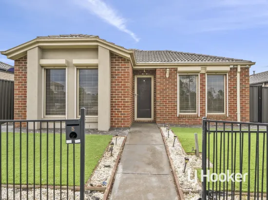 Charming Family Home with Outdoor Appeal in Prime Locale