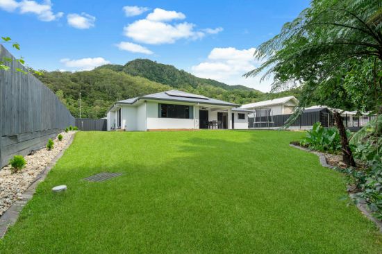 Stylish Family Living Against a Lush Tropical Backdrop