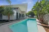 Modern Beachside Design with Family Flexibility