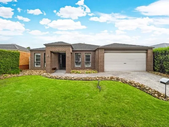LIGHT-FILLED FAMILY SANCTUARY IN A PREMIUM LOCATION!