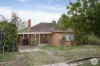 Classic Cream Brick Family Home in Blue-chip Black Hill