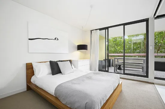 Rare large 63sqm one-bed apartment with balcony, and separate lot for valuable secure car space. Unbeatable location steps to Central & Crown st 