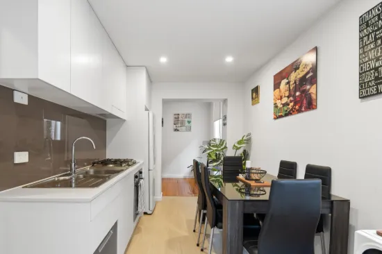 Two-bedroom residence with bonus retail income in prime Northcote