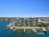 North-Facing Sub-Penthouse with Marina Berth & Sweeping Moreton Bay Views!
