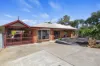 Immaculate Living Surrounded by Established Gardens