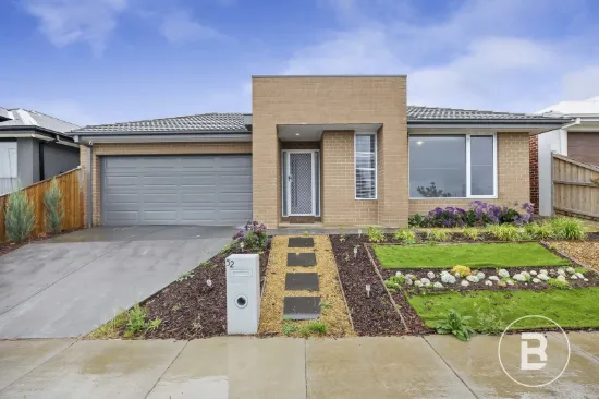 MODERN FOUR-BEDROOM HOME WITH MULTIPLE LIVING AREAS.