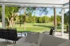 Exclusive Gated Living Overlooking the Prestigious Palms Golf Course