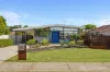 KICK BACK AND ENJOY THE RELAXED 60'S WARMTH OF THIS RETRO HOME