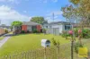 Opportunity Awaits - Solid Brick Home with Rear Lane Access