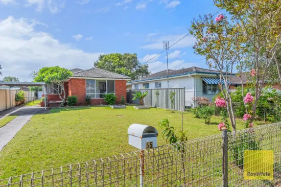 Opportunity Awaits - Solid Brick Home with Rear Lane Access