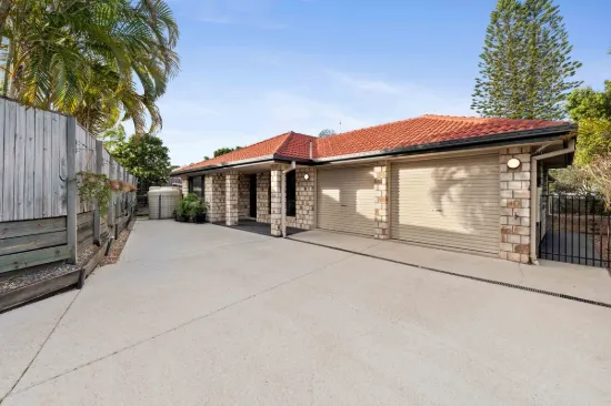 RARE SIX BEDROOM SINGLE STORY HOME ON LARGE PRIVATE BLOCK