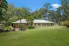 Expansive Home on Peaceful Acreage, Minutes from the Beach