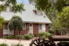 Cottage charm on a quarter acre with exceptional shedding