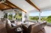 Architectural elegance , luxe finishes, panoramic views, and a family-friendly garden