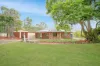 Charming Lowset Brick home in Quiet Cul-De-Sac- Plenty of sheds