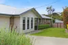 Modern Family Living in a Peaceful Village Setting