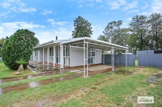 Charming Three-Bedroom Home with Rear Yard Access