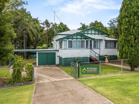 Charming Circa 1953 Queenslander on 1,012m² with Tropical Gardens and Timeless Character