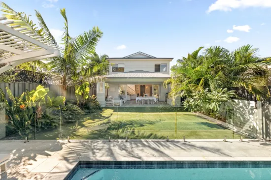 Resort-Style Charm, Family Functionality and Effortless Entertaining in a Prized Location