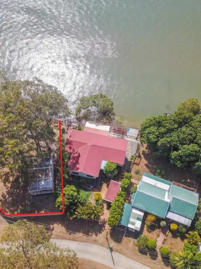 Waterfront Bliss Awaits – Finish Your Dream Retreat!