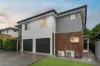 MODERN TURN-KEY TOWNHOUSE WITH INVESTMENT APPEAL