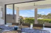 ELEVATED MODERN HOME WITH TRIPLE GARAGE & BAY VIEWS!!