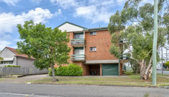 Elevated Two-Bedroom Apartment with District Views – Ready to Update