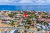 Perched on Top of the Hill on 1098m2 with  distant Ocean Views