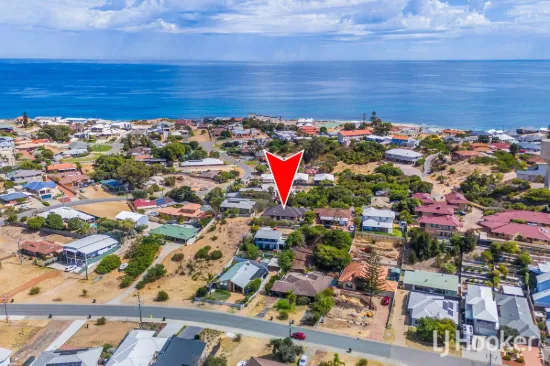 Perched on Top of the Hill on 1098m2 with  distant Ocean Views