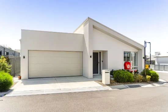 Resort-Style Living in a Beautifully Designed McDonald Jones Home