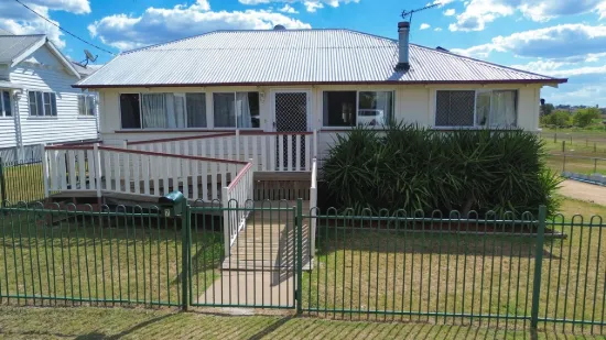 Rare Half-Acre Opportunity in Town - Space, Comfort & Endless Potential
