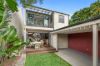 Contemporary reinvention of a classic weatherboard cottage with city views