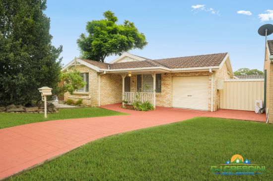 Neat, Updated & Move-In Ready with Drive-Through Garage