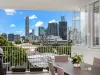 Stylish three-bedroom apartment commanding city views