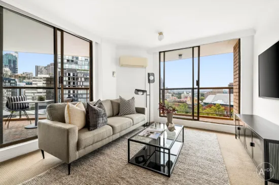 Elevated North-Facing Apartment with Harbour Views in Prime East Sydney Location