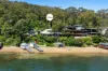 Unrivalled Position - North Facing Waterfront with Boathouse & Sandy Beach