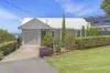 MODERN FARMHOUSE COTTAGE WITH STRIKING GOLD COAST VIEWS