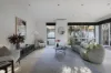 Light-Filled Oasis in Easy-Care Surrounds