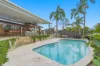 Elevated Living with Poolside Entertaining & Leafy Treetop Outlooks