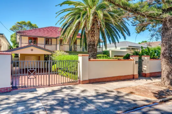 METRES TO THE BEACH  -  IMPRESSIVE 5 BEDROOM RESIDENCE