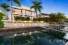 North-Facing, main river Views, 6-car basement garage, renovated