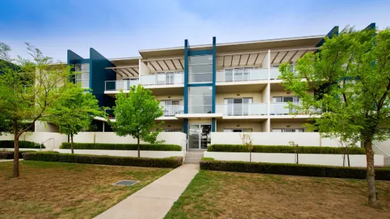 North facing Top Floor Apartment on Light Rail Strip