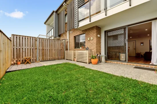 Standout Townhome with Grassed Yard and Double Car Space
