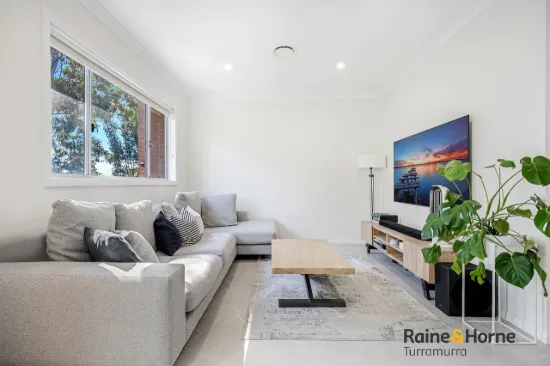Primely located architecturally designed four-bedroom townhouse