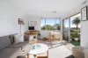 Top Floor Coastal Haven with Leafy Outlooks