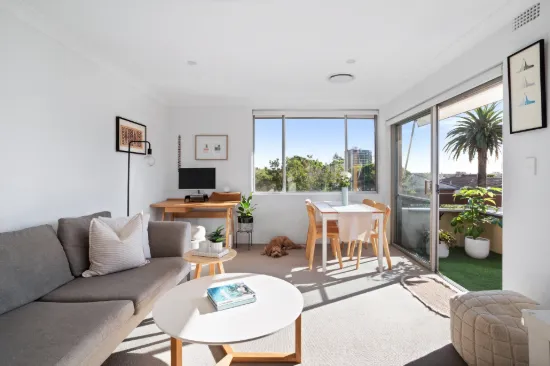 Top Floor Coastal Haven with Leafy Outlooks