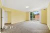 Full-Brick Two-Bedroom Unit Peacefully Tucked Away at the Rear