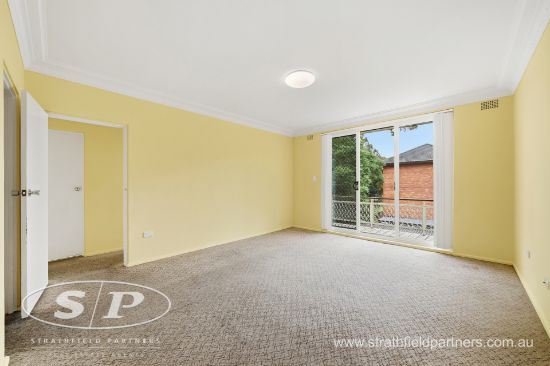 Full-Brick Two-Bedroom Unit Peacefully Tucked Away at the Rear